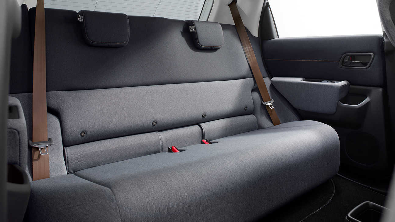 Honda e interior showing rear seats.