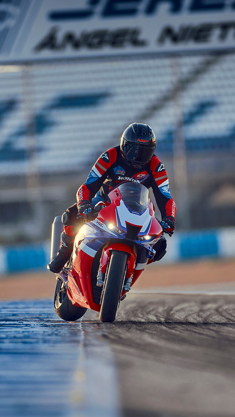 Front 3/4 facing static Honda CBR1000rr-r Fireblade on the track.